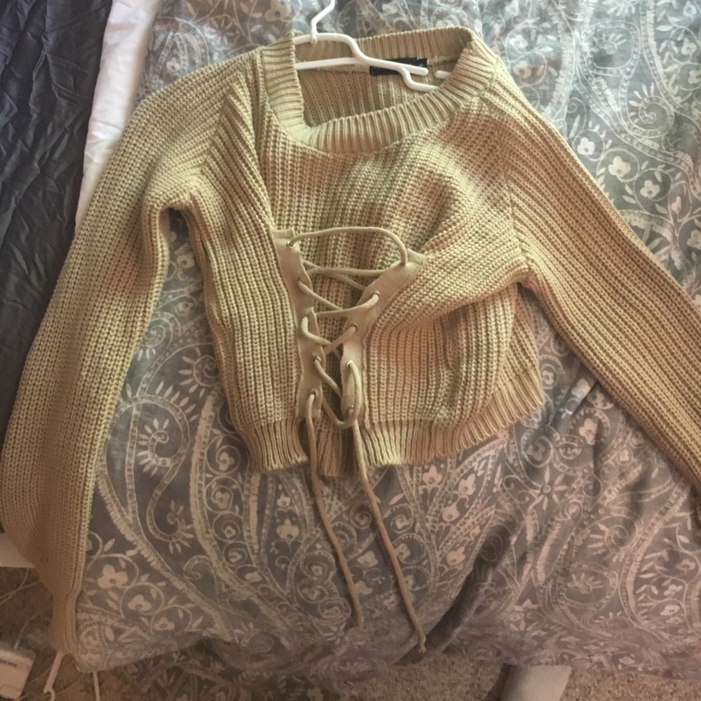 Cross sweater